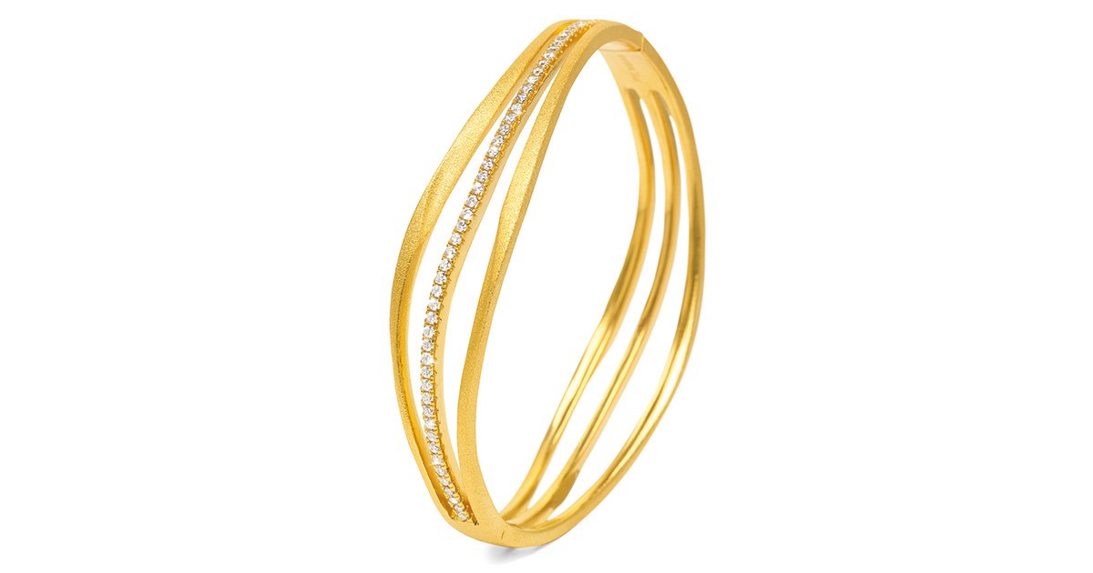 3_F20_Bernd_Wolf_Armreif_Sentro_63019156_01_OW_20_Silber_925_24kt_goldplattiert_Zirkonia_Original