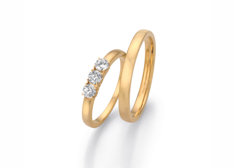 Trauringe aus 14 Karat Gelbgold, Damenring mit Brillanten in 0,48 ct. © Collection Ruesch